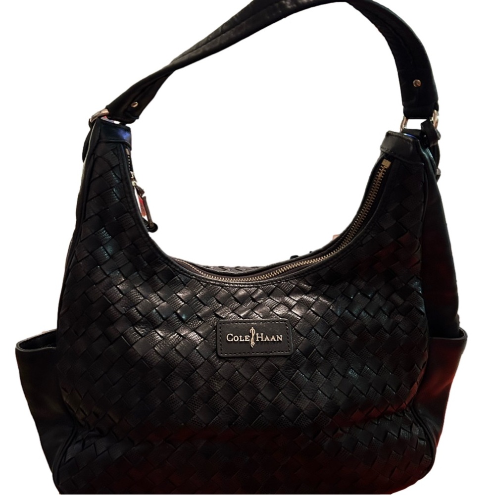 Cole Haan black leather shoulder bag.